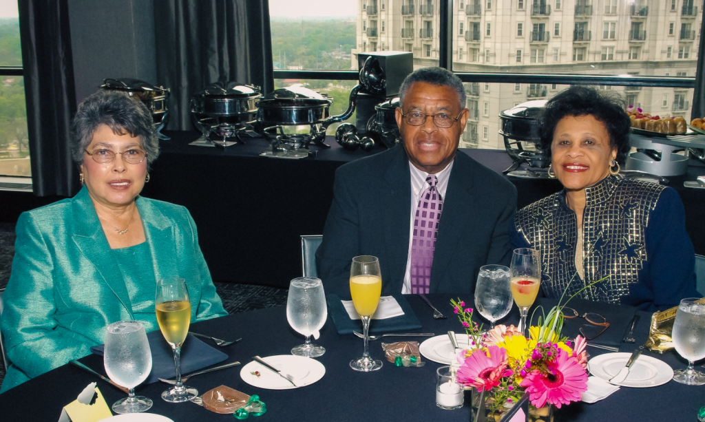 Mature African-Americans celebrate at a luncheon