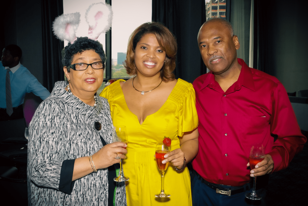 African-Americans posing before a toast